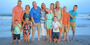 Myrtle Beach Photographers at the Beach capture the "silly face" photo during a family beach photo shoot.